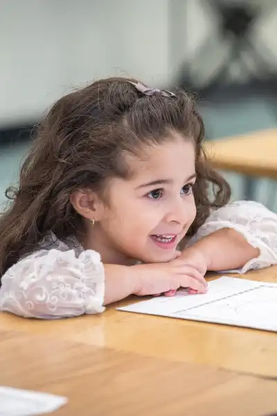 Elementary school girl smiling.